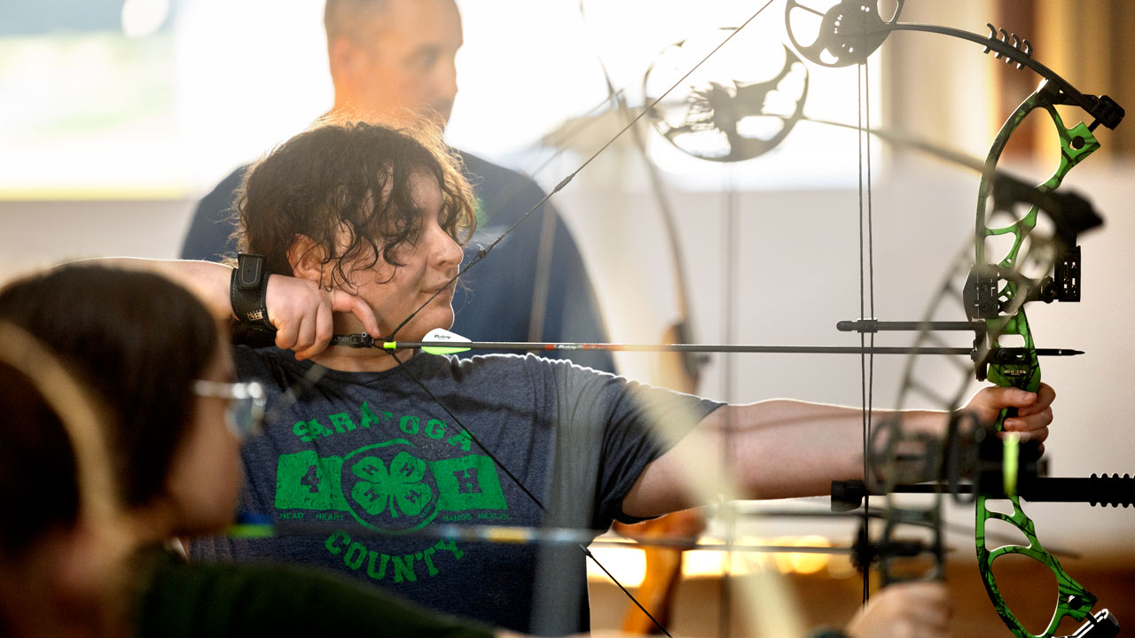 Members of the Saratoga County 4-H Sport Shooting program participate in an archery practice session at the Saratoga County 4-H Training Center.